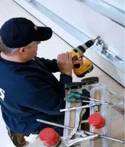 Garaga Experts working on a door