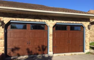House with wooden garage doors